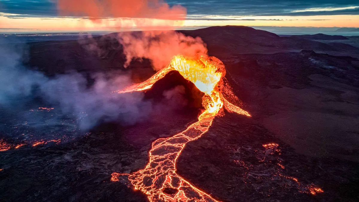 Aerial view of the lava field and craters seen on a helicopter Fagradalsfjall volcano tour over the Reykjanes Peninsula, Iceland